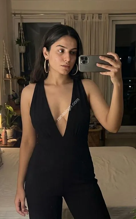 Akshara posing in apartment