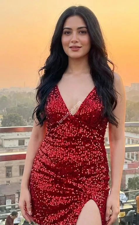 Sakshi in red dress rooftop